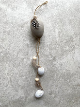 Load image into Gallery viewer, Hanging Easter Eggs | Decorative Artificial Grey &amp; White Speckled Eggs hanger | Real Guinea Fowl Feathers | 38cm long